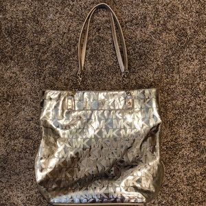 Micheal Kors gold purse